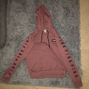 a light pinkish Pink Victoria’s secret hoodie